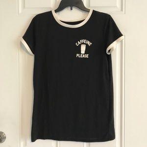 black shirt with white around the neck line